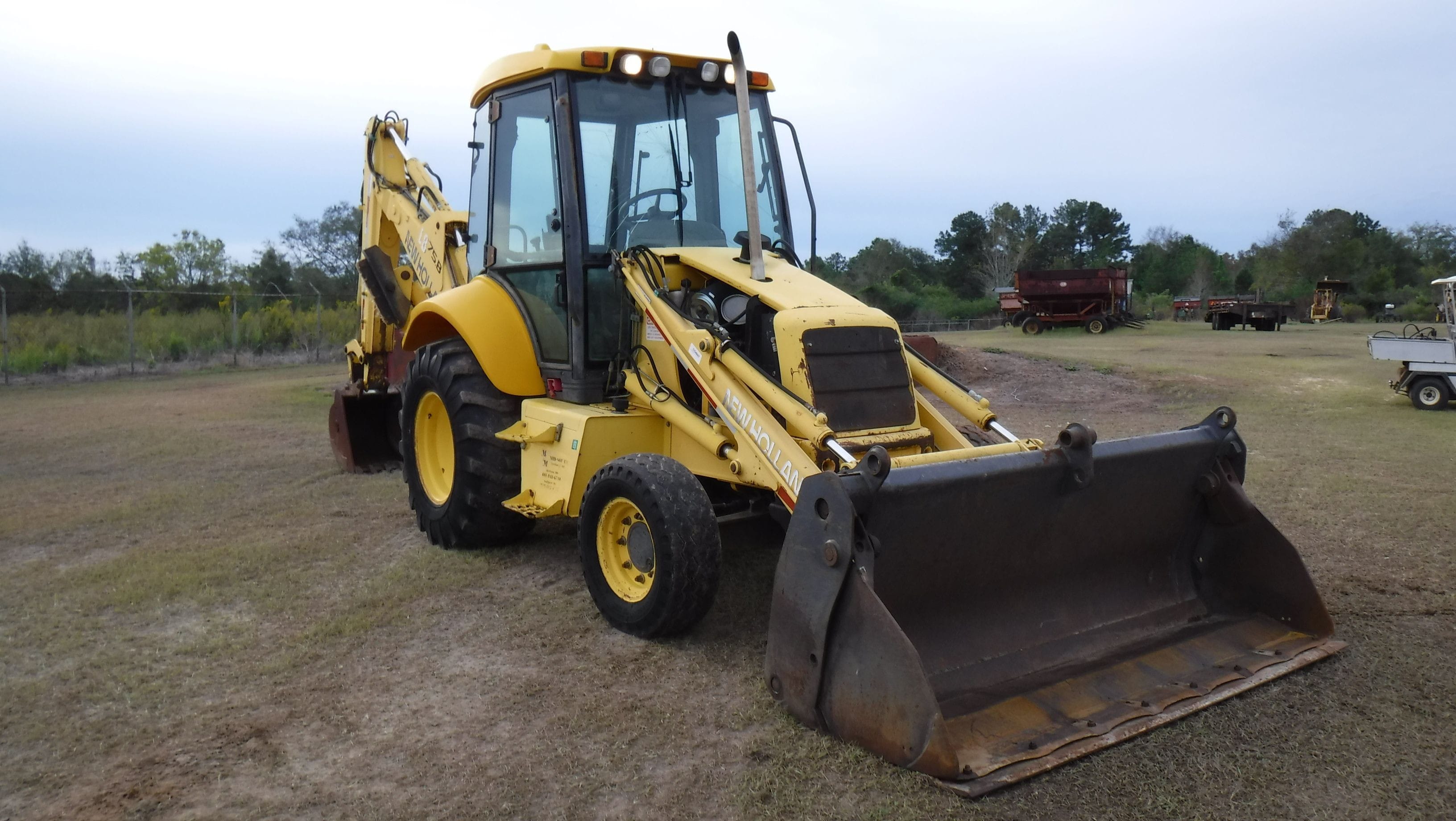 BURTON AUCTION CO DOTHAN ALABAMA LOADER BACKHOES SKID STEER